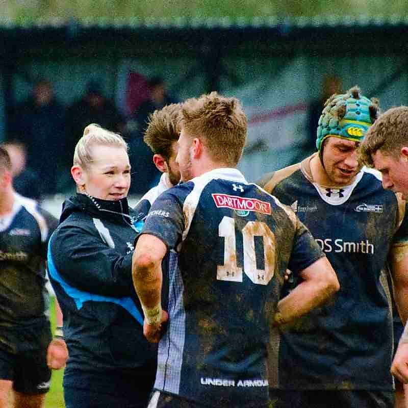 Lauren assisting a rugby player